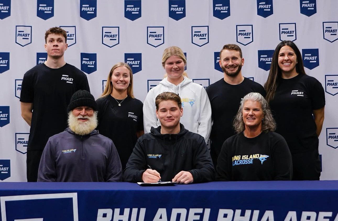 Drew with lacrosse athlete at signing day - Long Island